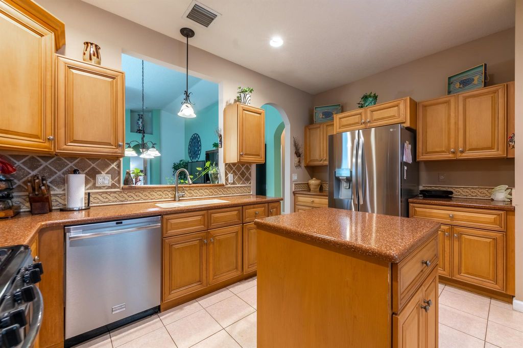 Photo of 407 NW Granville Street, Port Saint Lucie, FL 34986 (MLS # R10953959)