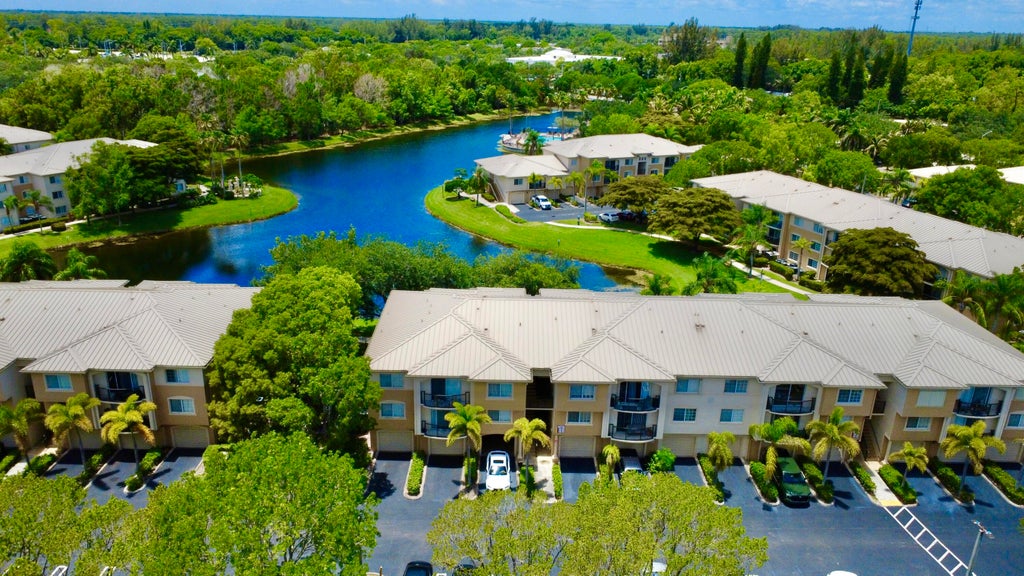 Photo of 500 N Crestwood Ct Court N #502, Royal Palm Beach, FL 33411 (MLS # B26038546)