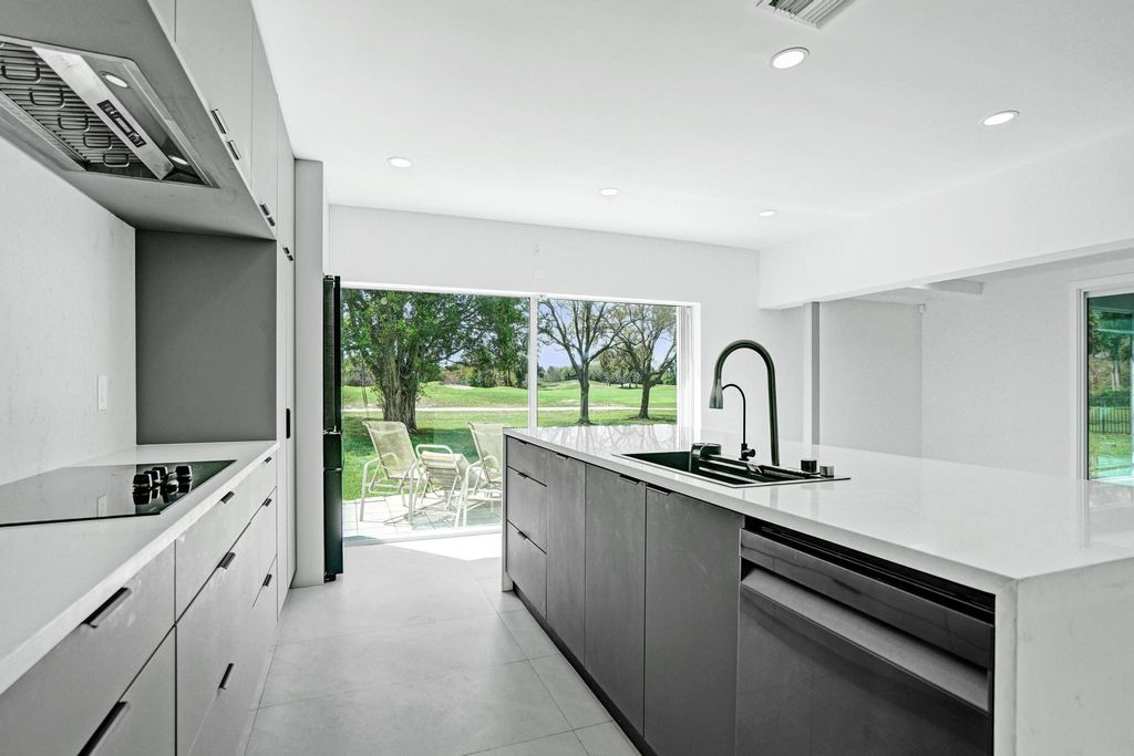 Photo of 6700 E Tropical Way, Plantation, FL 33317 (MLS # B26002373)