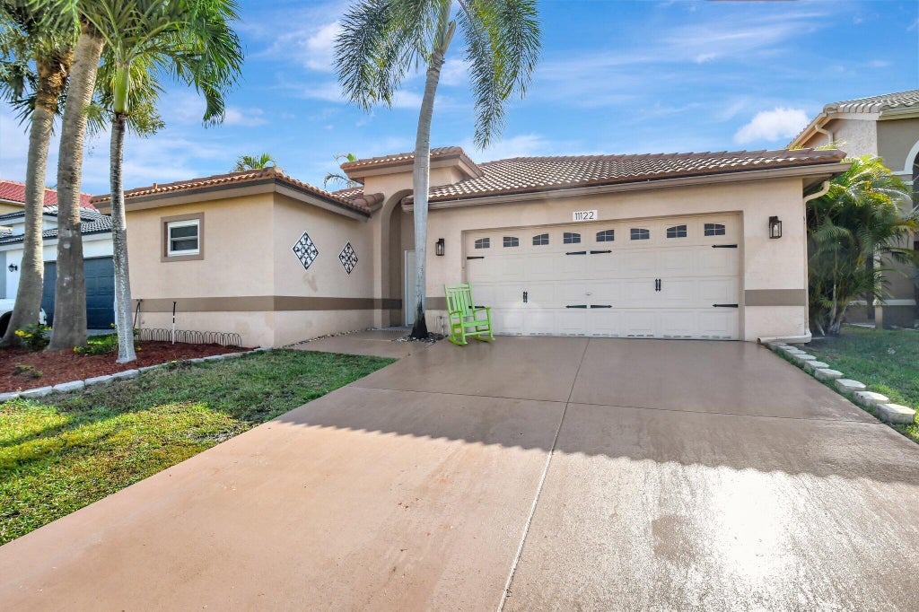Photo of 11122 Harbour Springs Circle, Boca Raton, FL 33428 (MLS # R11077133)