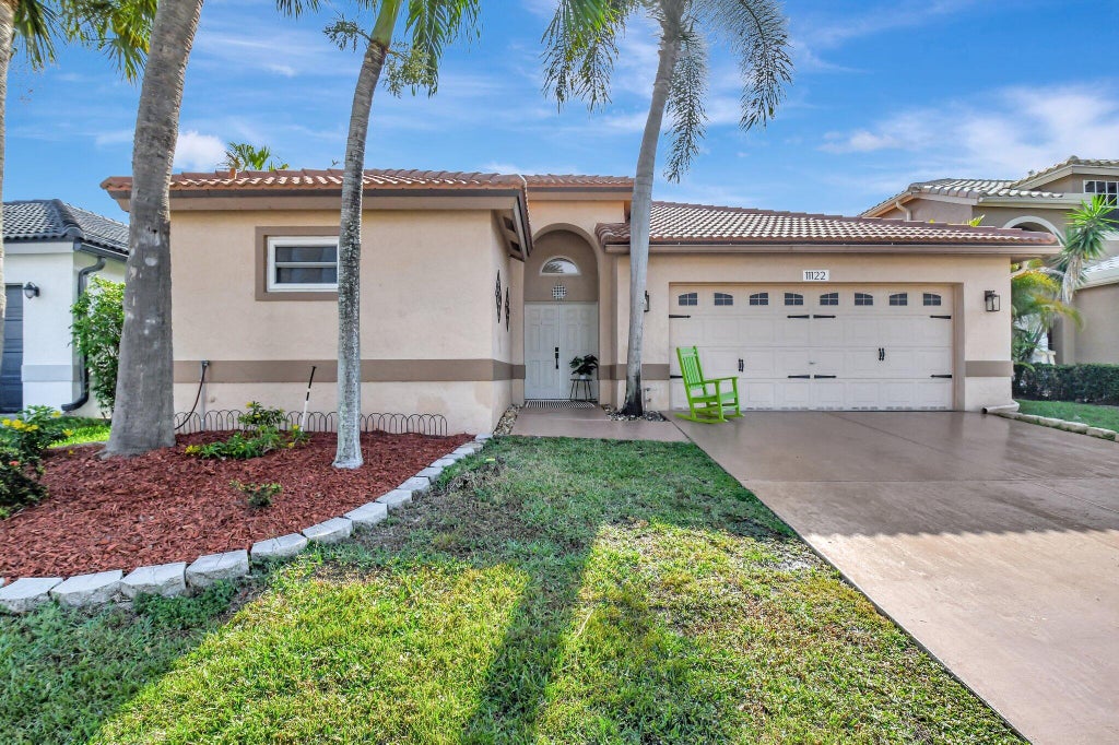 Photo of 11122 Harbour Springs Circle, Boca Raton, FL 33428 (MLS # R11077133)