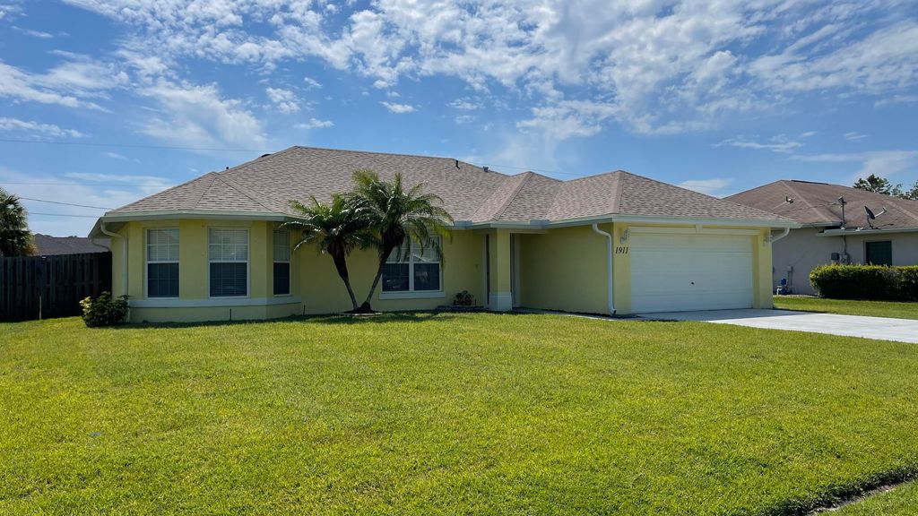 Photo of 1911 SE Camilo Street, Port Saint Lucie, FL 34952 (MLS # R10803535)