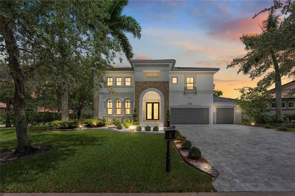 Photo of 7582 NW 127th Manor, Parkland, FL 33076 (MLS # F10507189)