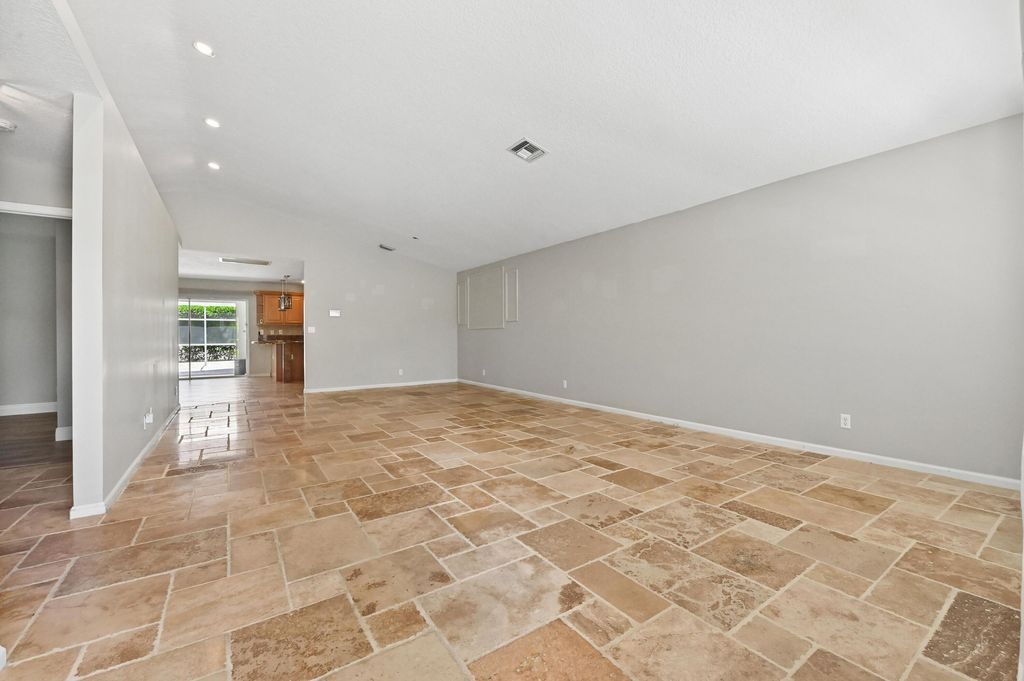 Photo of 1163 Peninsula Way, Greenacres, FL 33413 (MLS # B26025627)