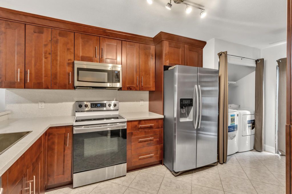 Photo of 9934 Royal Palm Boulevard #9934, Coral Springs, FL 33065 (MLS # B26018794)