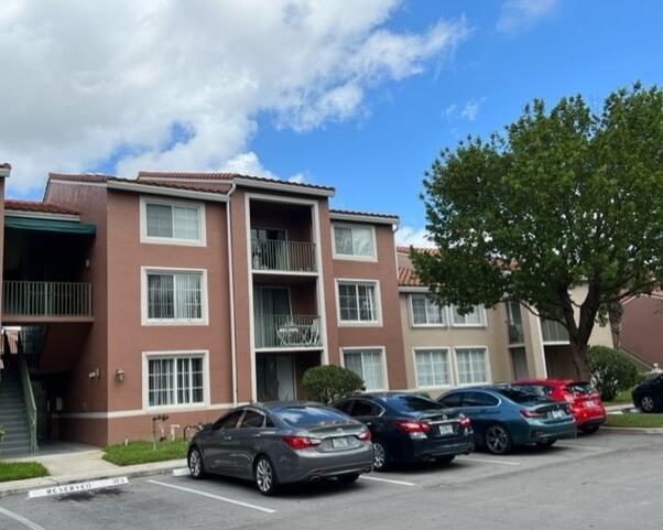 Check out this gorgeous 3 bedroom condo located in a gated community. Situated on the corner of the 2nd floor, this home features an open and bright floor plan with soaring ceilings in the dining and living areas. The kitchen and bathrooms were fully remodeled just three years ago, and the entire home features sleek tile flooring. The master bedroomoffers a spacious walk-in closet, while the third bedroom includes a convenient pocket door, perfect for use as a private suite. Enjoy peaceful lake views from the covered balcony, as well as from all three bedrooms. The unit also comes with an in-unit washer and dryer. Community amenities include a clubhouse, pool, and fitness room. Water and basic cableare included in the rent. Ideally located near A-rated schools and within walking