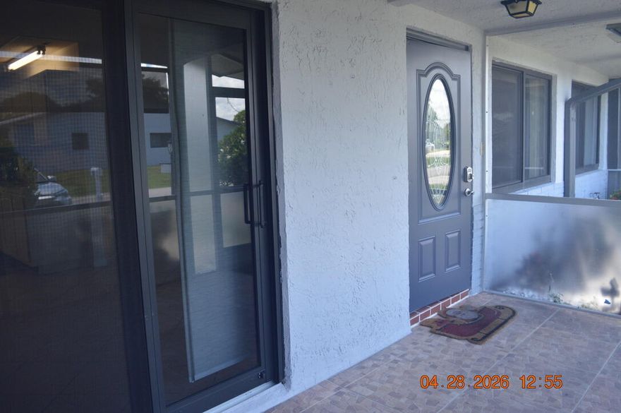 Active 55+ community of single story villas,  buildings have new roofs, gutters, freshly painted and driveway power cleaned by HOA.  Enjoy Florida living at its best with plenty of amenities, including 2 pools, hot tub full gymnasium, meeting rooms pool tables, active clubhouse with monthly shows.  Impact doors and windows.  Unit has floor tiles throughout, front screened patio and private concrete driveway in front for 2 cars.  All residents must be at least 40 years old.