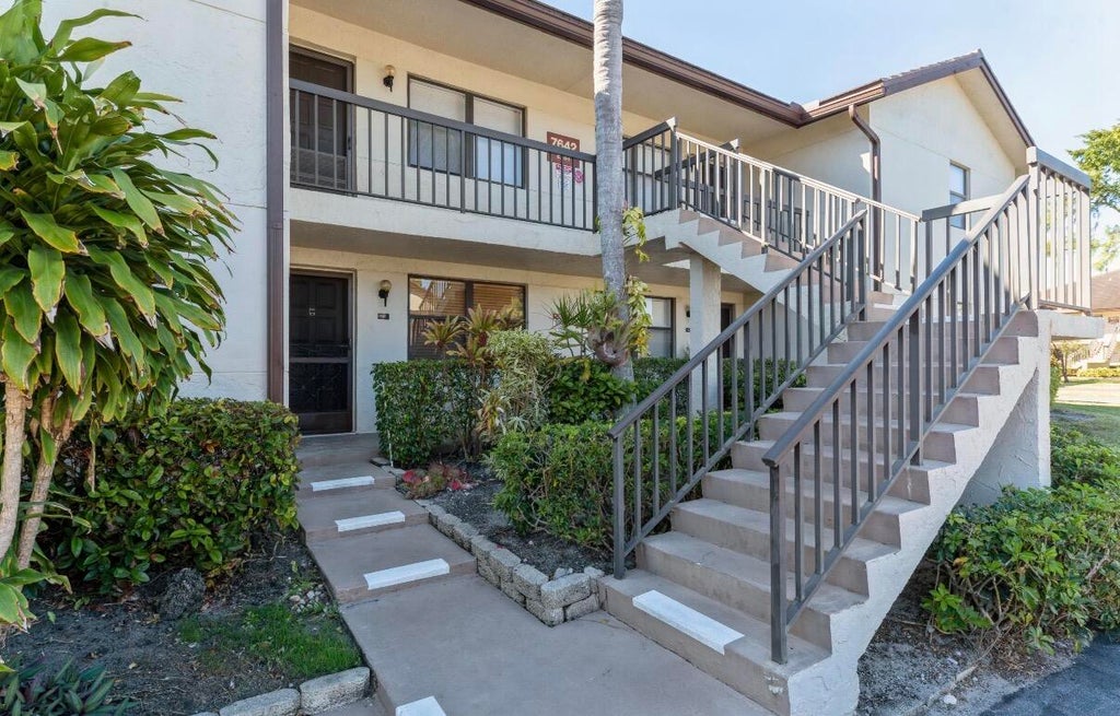 Photo of 7642 Tahiti Lane #101, Lake Worth, FL 33467 (MLS # B26084155)