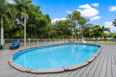 Tiny photo for 6911 NW 84th Avenue, Parkland, FL 33067 (MLS # B26033514)