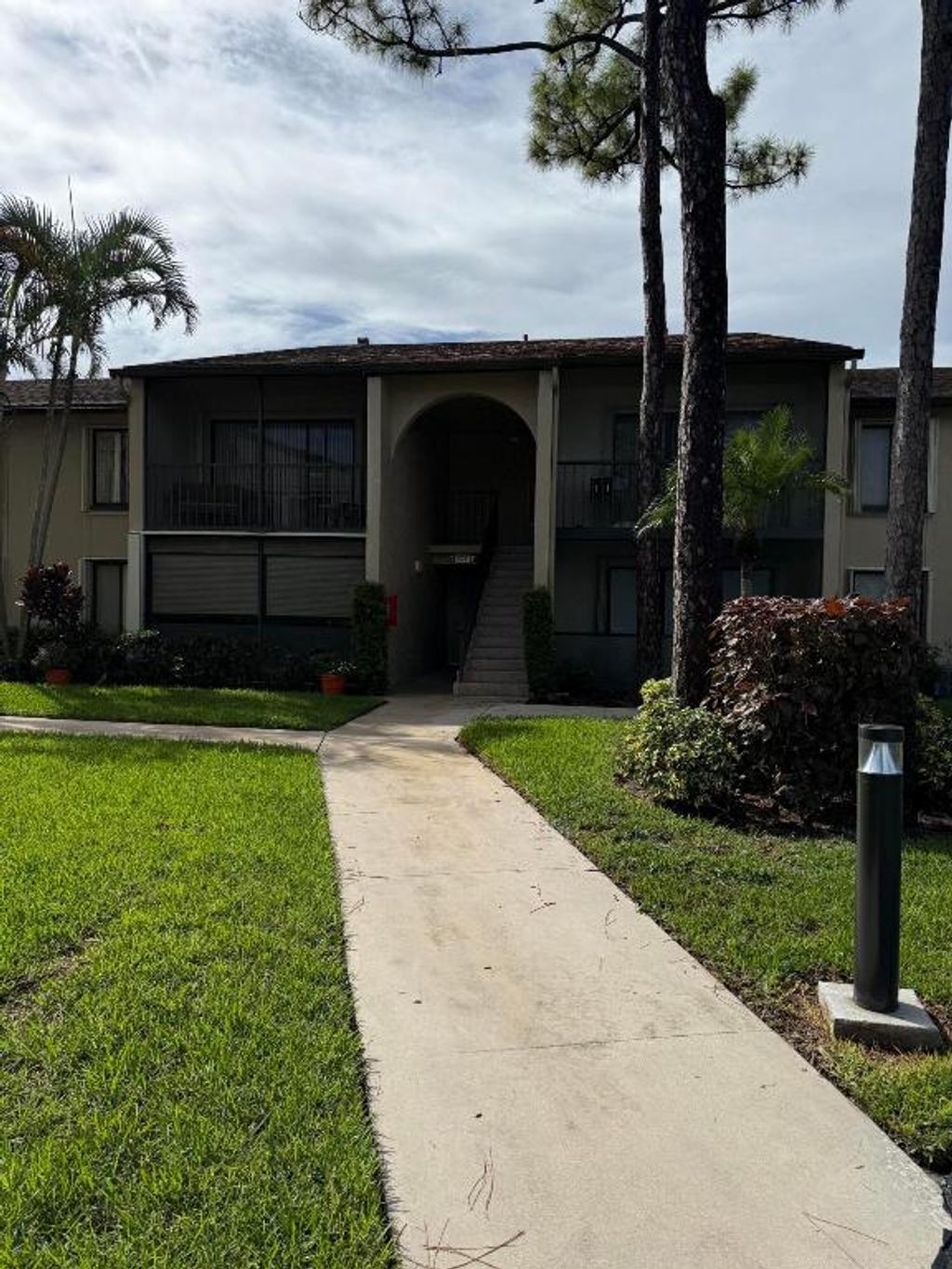 Photo of 707 Sunny Pine Way #F2, Greenacres, FL 33415 (MLS # R11132774)