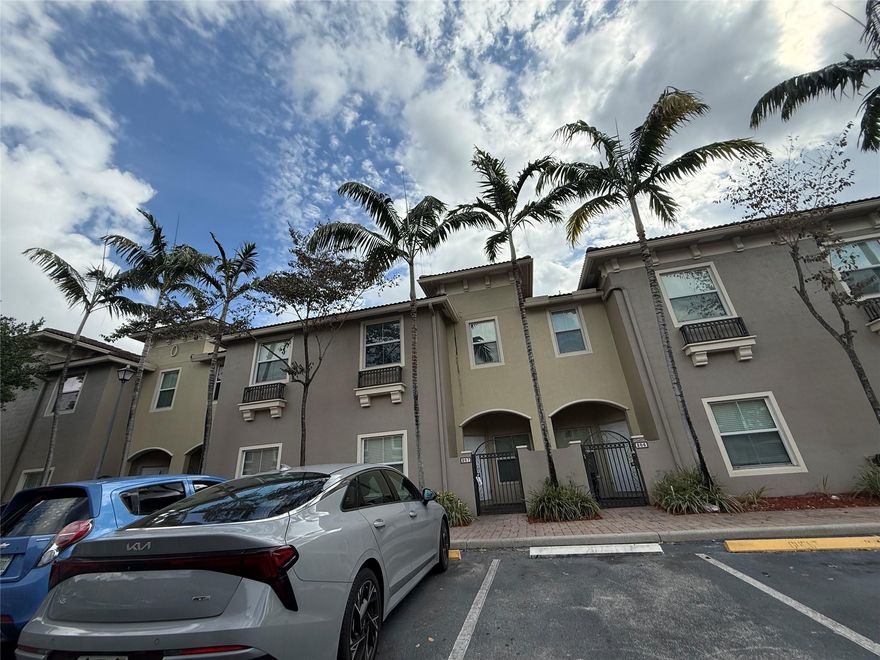 Eloquently remodeled two story town house in gated community, ideally located, close to highways, shopping, and dining. Lake view. LED Ceiling-Mounted Lights throughout. Double Vanity Sinks in Master bathroom. Custom Walk-in closet in Master bedroom. Fully Equipped Gourmet Kitchen with Quartz Countertops. Hardwood Style Flooring Throughout. Ceiling Fans. Full-Size Washer & Dryer. Water and exterior yard maintenance included. Hardwired for Cable. Community pool. Immediate move in available. No association approval process required