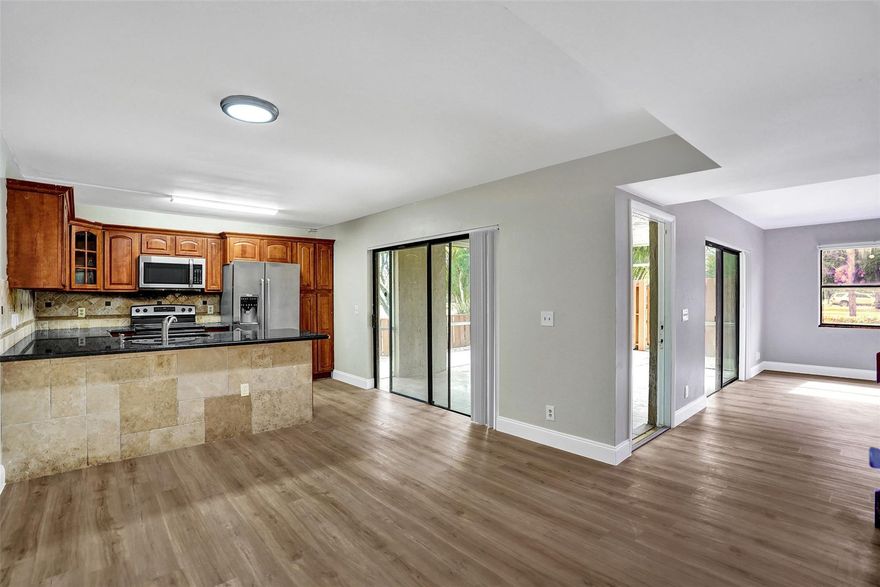 Fully renovated and updated 3BR / 2.5BA lakefront townhouse featuring all-new flooring, fresh interior paint, LED lighting, and a newer A/C. Completely updated bathrooms with LED mirrors and a large open kitchen with granite countertops and stainless steel appliances. In-unit washer and dryer. Enjoy a large screened porch overlooking the lake. Freshly painted and move-in ready. Great location, near Sawgrass Mills Mall, shopping, dining, public transportation, parks, and major roads.