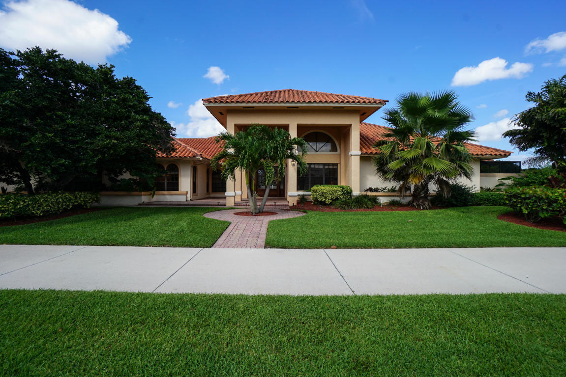 Fantastic Family Estate Pool Home with over sized lake and golf view large lot. Split floor plan with large family room, living, oversized dining room for entertaining guests and holidays. What an amazing location on a small estate home street with such a private estate home setting. Spotless oversized three car garage with private motor-court side entrance. Massive patio and covered area for large gatherings with volume ceilings and a very large master bedroom suite.