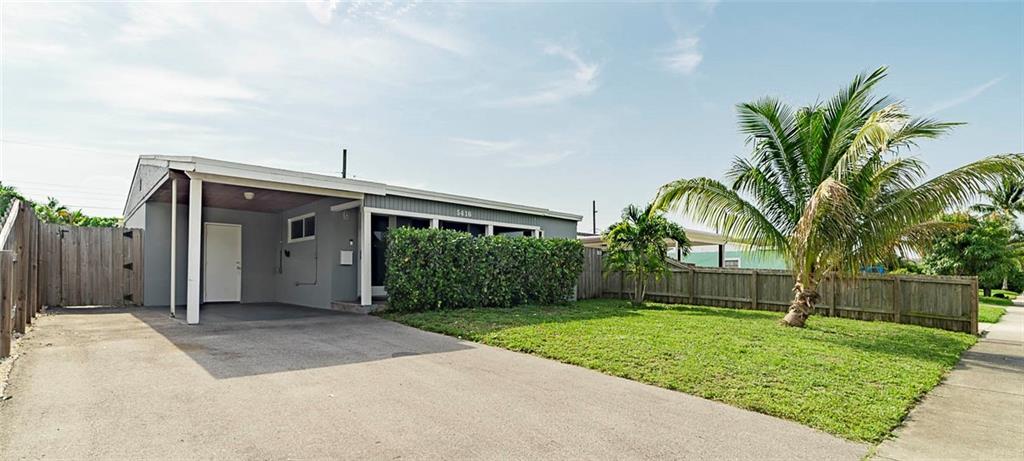 Immaculate two bedroom well maintained and cared for home located in the heart of Oakland Park. Kitchen has upgraded cabinetry with granite countertops. newer appliance package, gas stove is a plus! Designer lighting and fans throughout. Full impact windows throughout. A/C was replaced in 2019. Dryer, stove and water heater are all on community propane gas draw. There is a delightful big yard and large carport. Carport has been fitted with 240 EV plug for electric automobile.