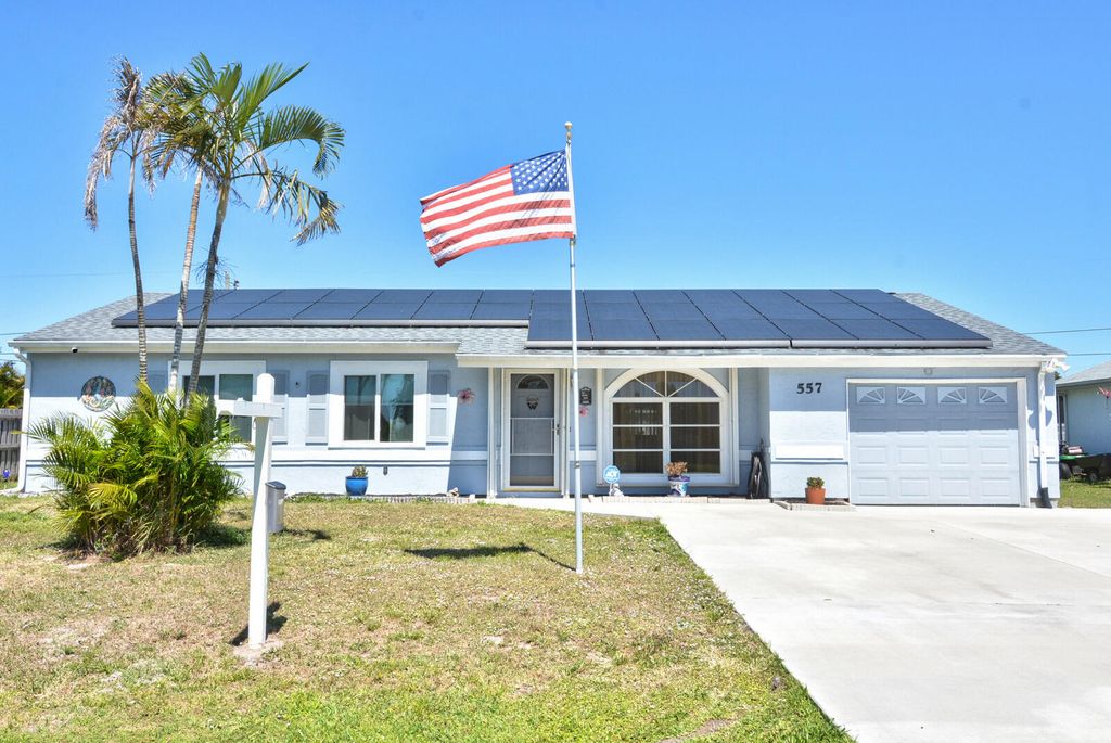 Photo of 557 SE Seahouse Drive, Port Saint Lucie, FL 34983 (MLS # R11073781)