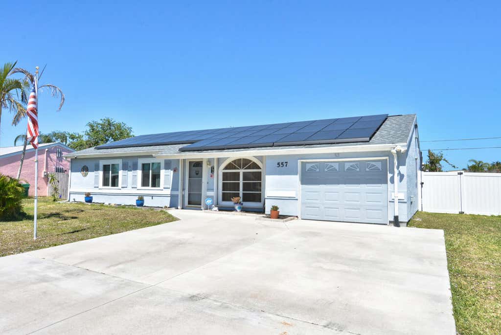 Photo of 557 SE Seahouse Drive, Port Saint Lucie, FL 34983 (MLS # R11073781)