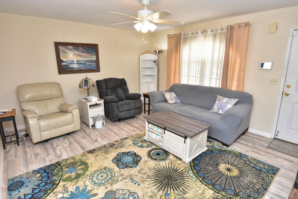 Photo of 557 SE Seahouse Drive, Port Saint Lucie, FL 34983 (MLS # R11073781)