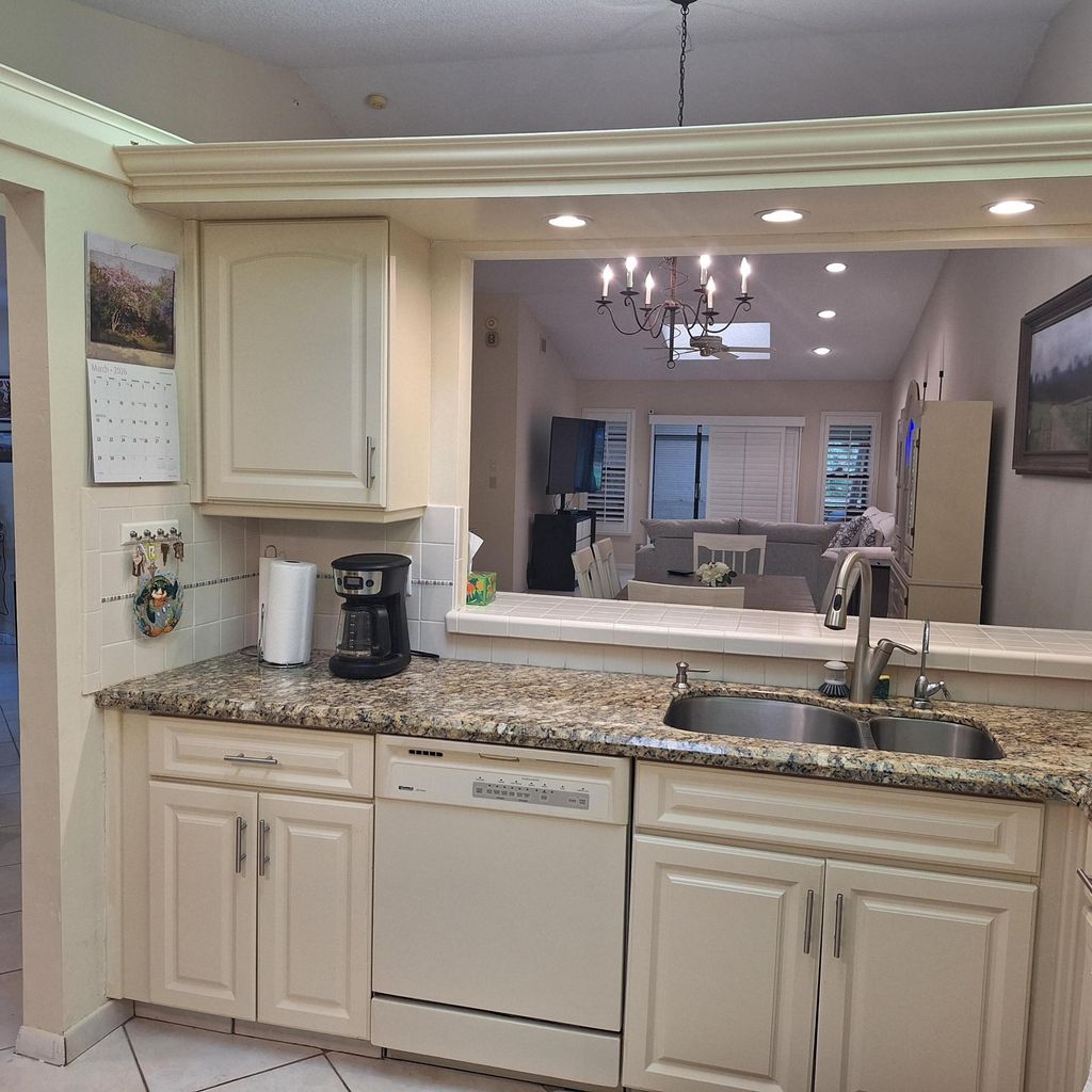 Photo of 10044 Andrea Lane, Boynton Beach, FL 33437 (MLS # B26001792)