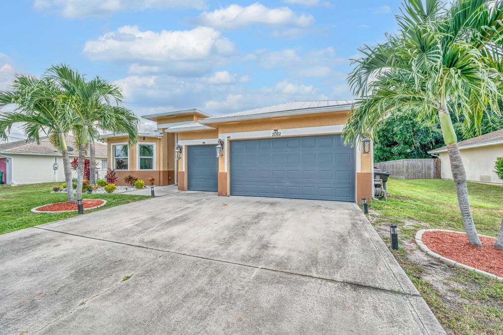 Photo of 2082 SW Idaho Lane, Port Saint Lucie, FL 34953 (MLS # R11114520)