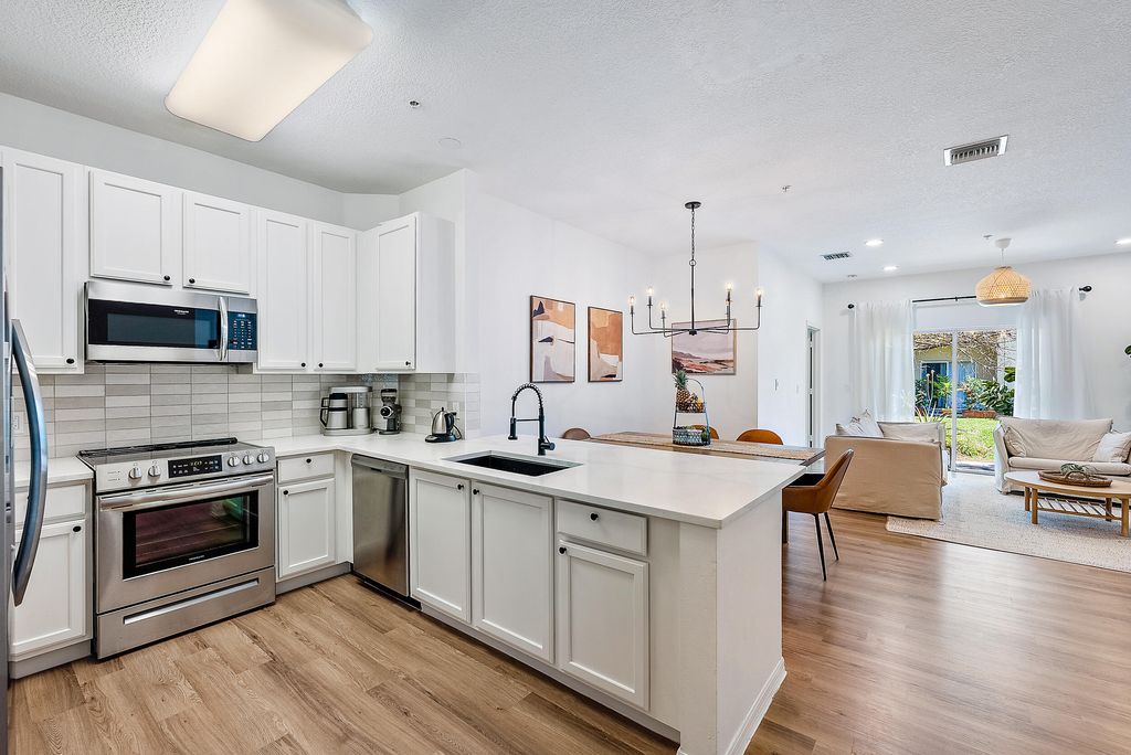 Photo of 114 Lighthouse Circle #I, Tequesta, FL 33469 (MLS # R10869571)