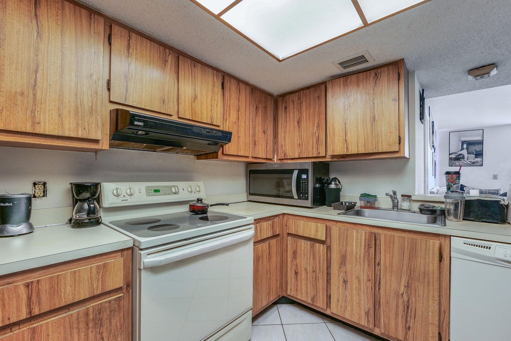 Photo of 5570 NW 44TH Street #509A, Lauderhill, FL 33319 (MLS # B26065321)
