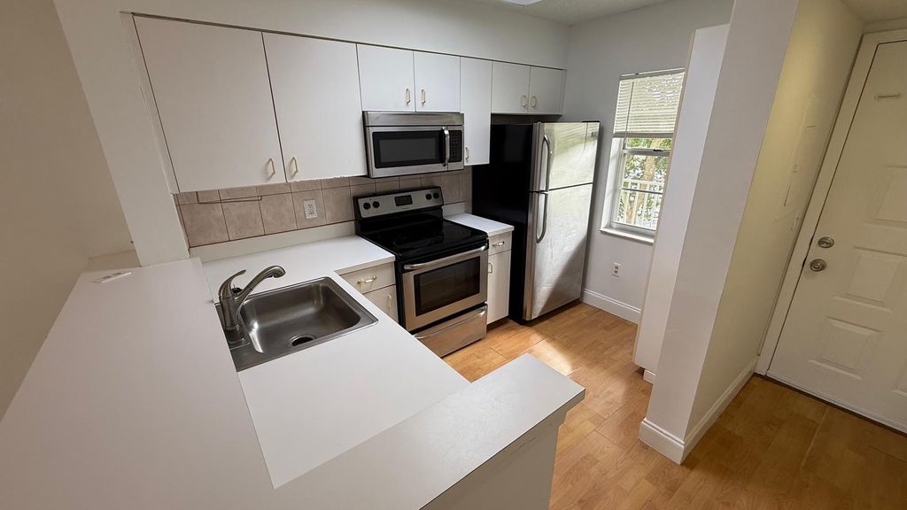 Photo of 2236 N Cypress Bend Drive #403, Pompano Beach, FL 33069 (MLS # F10516527)