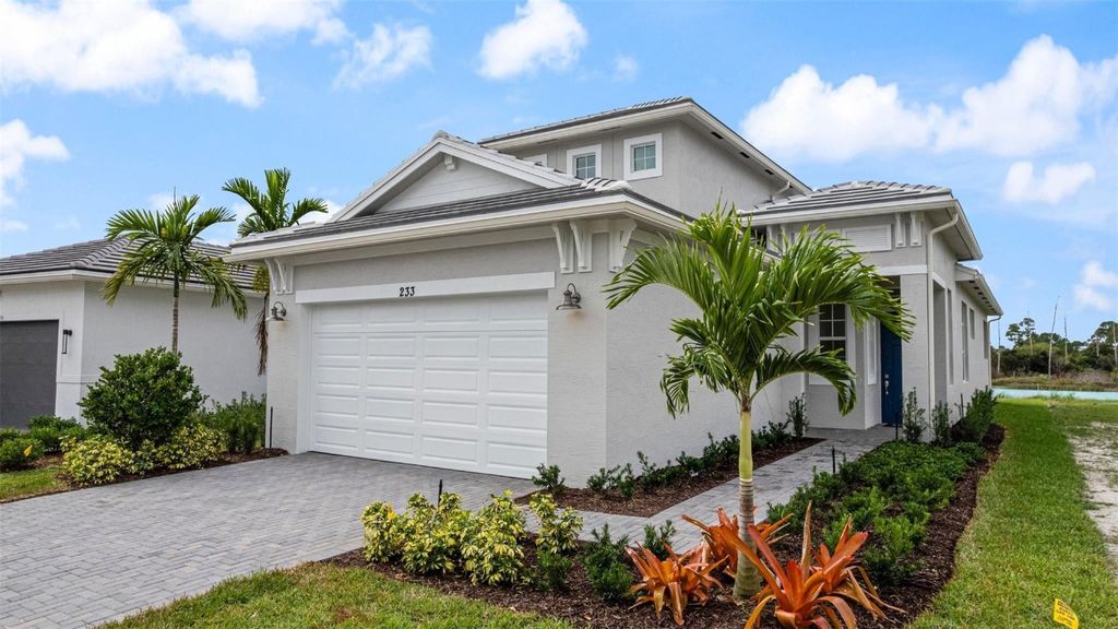 Photo of 233 SE Via Sangro, Port Saint Lucie, FL 34952 (MLS # F10538896)