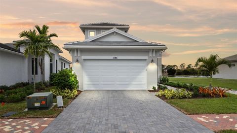 Photo of 233 SE Via Sangro, Port Saint Lucie, FL 34952 (MLS # F10538896)