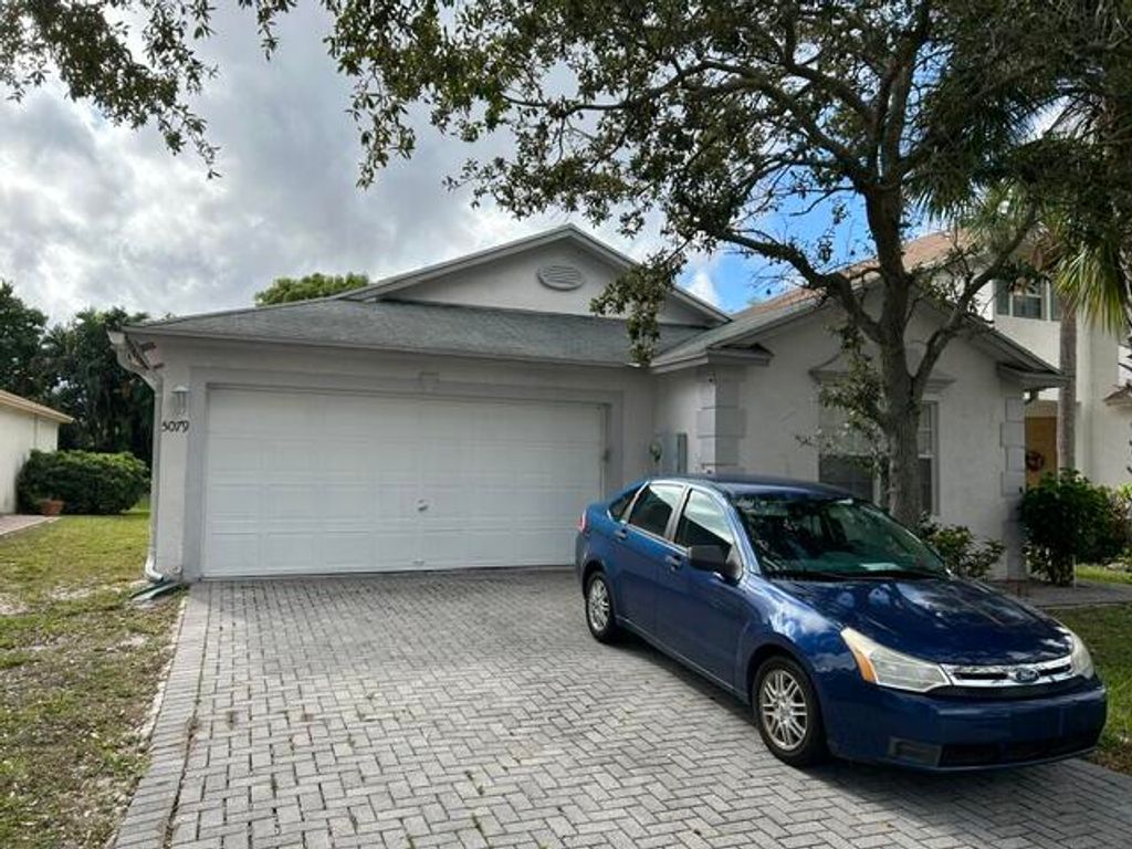 Photo of 5079 Rambler Rose Way, West Palm Beach, FL 33415 (MLS # B26028101)