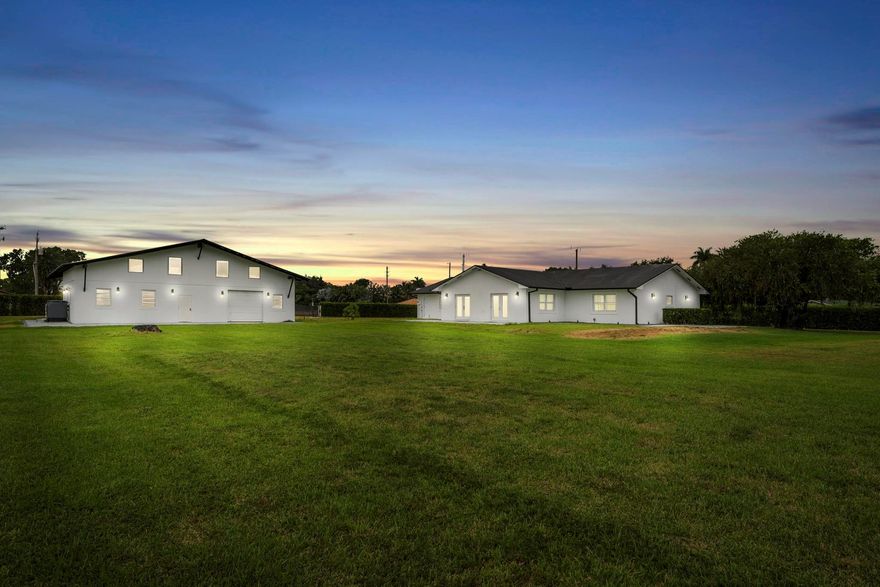 Rare  nearly 10 Acre property in Southwest Ranches. This expansive 9.65-acre lot offers cleared and semi-filled land, perfect for development, a nursery, or a horse ranch. Included is a fully remodeled 4 bed, 3 bath home and a 2,000 sq ft two-story Barn/Workshop. Updates include new tile floors, a contemporary kitchen with quartz countertops and stainless steel LG Studio appliances, renovated bathrooms, recessed lighting, sleek linear AC vents, and two new AC units with smart Nest thermostats. Fresh paint and redone stucco enhance the exterior, along with a new septic tank & electric gate. Potential to subdivided into 4 lots, buyer due diligence required, buyer responsible to confirm all information with the town of Southwest Ranches.