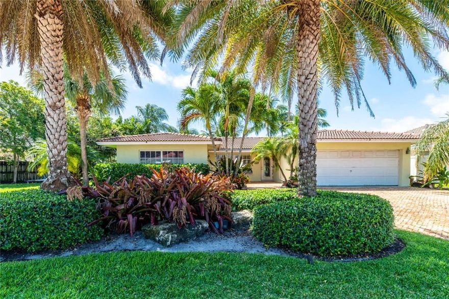 A special home located on the lake w/approved 40 FTt. finger dock on a beautiful cul-de-sac of 7 homes, on a rare saltwater lake in Cypress Lake! Welcoming curb appeal w/mature tropical landscaping. Classy Chicago brickpavers circular driveway & 2-CG greet you. There are striking water views from the moment you come home. Many impact windows&doors including slider which showcase the serene water views. The home has a wonderful feel & true Southern Exposure. Re-marcited pool. Great kitchen layout and flow. Stainless appliances with gas cooktop. The home is 4/2, 4th bedroom is currently used as a den. The home is located 1 mile from all entertainment! Greg Norman designed public course, amphitheater, 3.5 miles of wide sandy beaches, 75+parks, casino, fine dining & shopping. PompanoBeachCRA