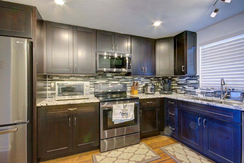 Photo of 3040 Lake Shore Drive #502, Riviera Beach, FL 33404 (MLS # R11134911)