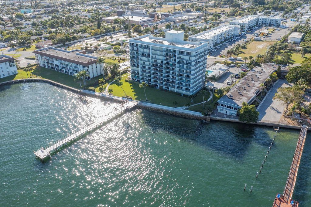 Photo of 3040 Lake Shore Drive #502, Riviera Beach, FL 33404 (MLS # R11134911)