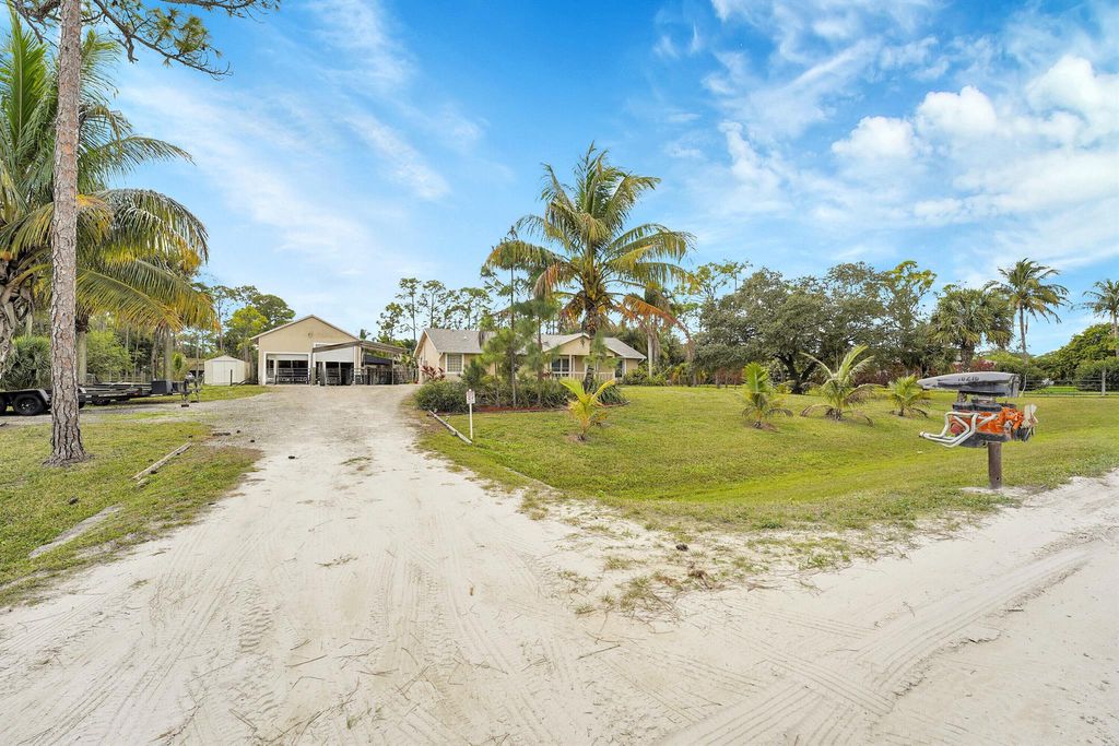 Photo of 16216 Murcott Boulevard, The Acreage, FL 33470 (MLS # R11128726)