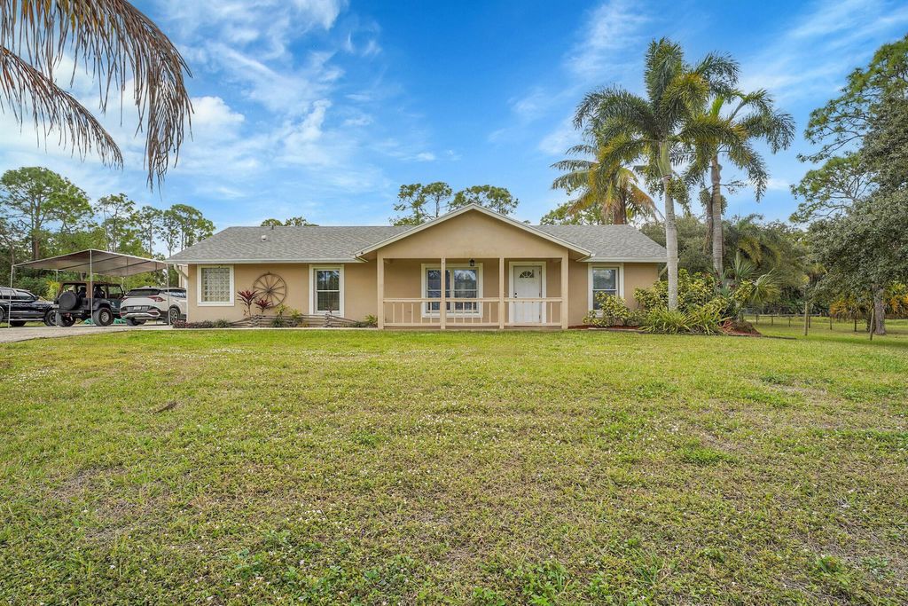 Photo of 16216 Murcott Boulevard, The Acreage, FL 33470 (MLS # R11128726)