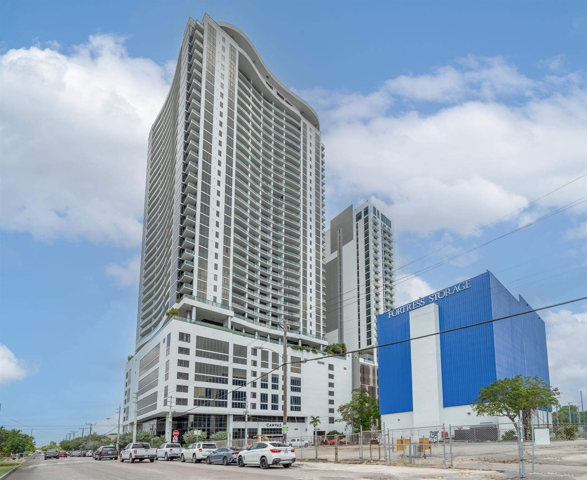 Spectacular 2 bed / 2 bath residence at CANVAS with stunning bay and city views. Features include an open kitchen, split floor plan, modern tile throughout, impact windows and doors, and a spacious balcony perfect for enjoying skyline sunsets and city lights. CANVAS offers 30,000+ sq. ft. of resort-style amenities including sunrise and sunset pools, spa, sauna, 3,000 sq. ft. state-of-the-art gym, yoga garden, racquetball court, theater, social and game rooms, children’s playroom, eco-friendly gardens, indoor/outdoor café and bar, plus 24/7 security, concierge, on-site management, and self-parking. *** Unit has storage on same floor # 15D *** Condo fee includes: Water, basic cable, and trash.