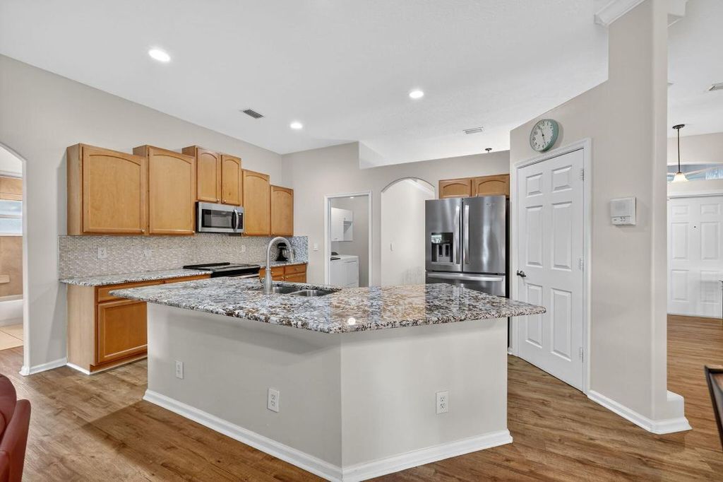 Photo of 1342 SW Oriole Lane, Port Saint Lucie, FL 34953 (MLS # R11155047)