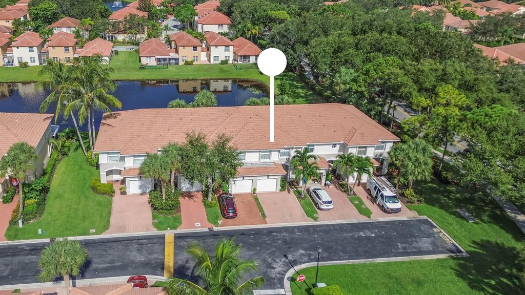 Photo of 6161 Seminole Gardens Circle, Riviera Beach, FL 33418 (MLS # R10904124)