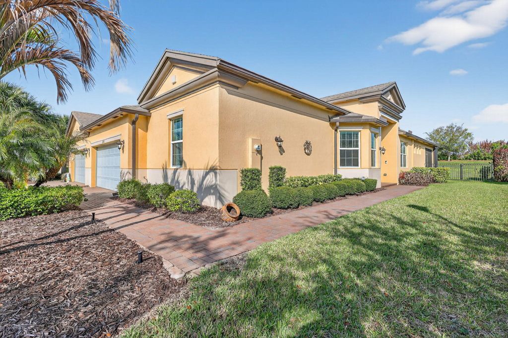 Photo of 12932 SW Lake Fern Circle, Port Saint Lucie, FL 34987 (MLS # B26007234)