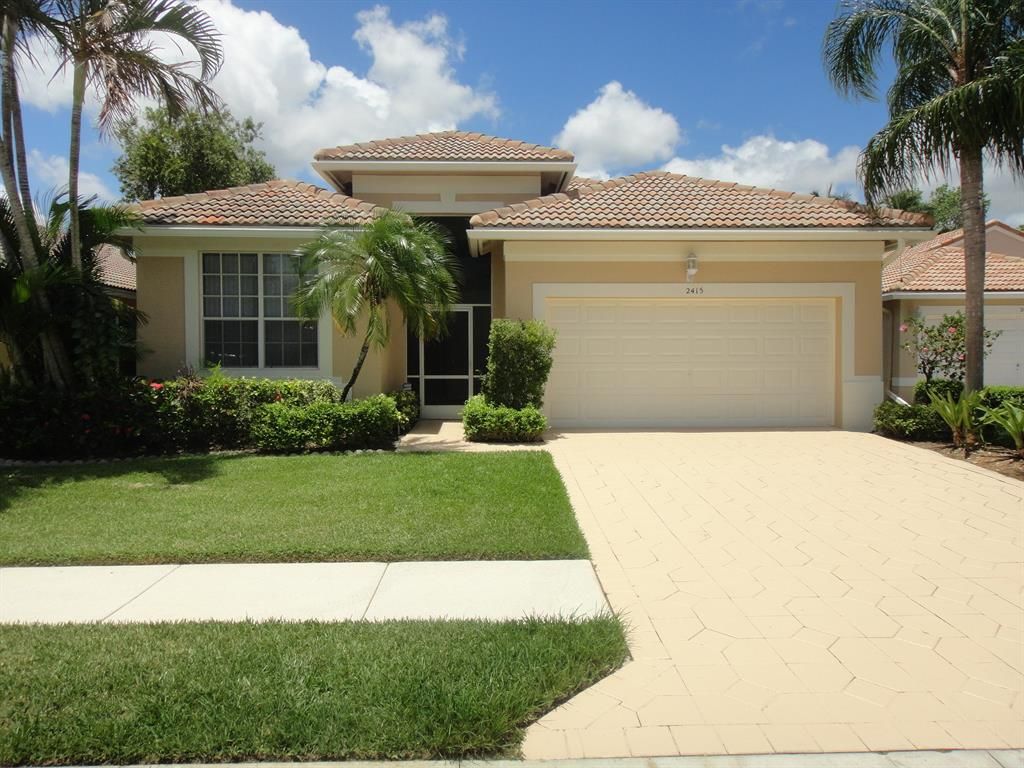 Photo of 2415 Pigeon Cay, West Palm Beach, FL 33411 (MLS # R10822013)