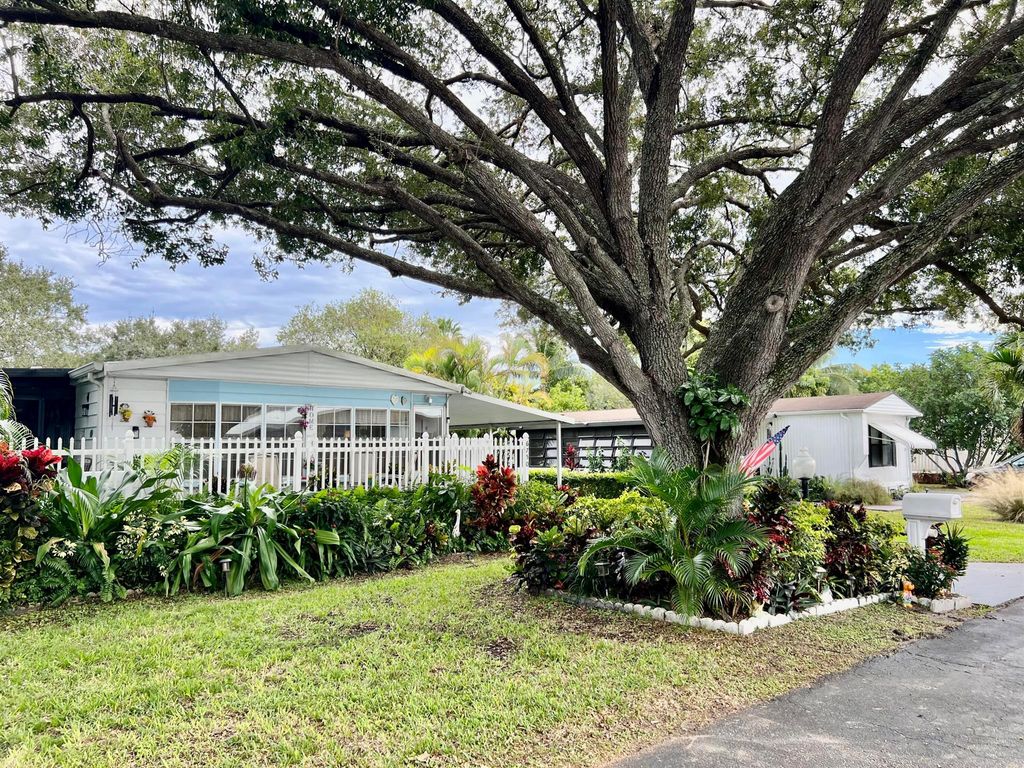 Photo of 6750 NW 44th Way, Coconut Creek, FL 33073 (MLS # R10966952)