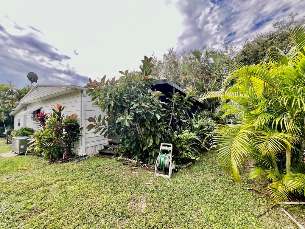 Photo of 6750 NW 44th Way, Coconut Creek, FL 33073 (MLS # R10966952)