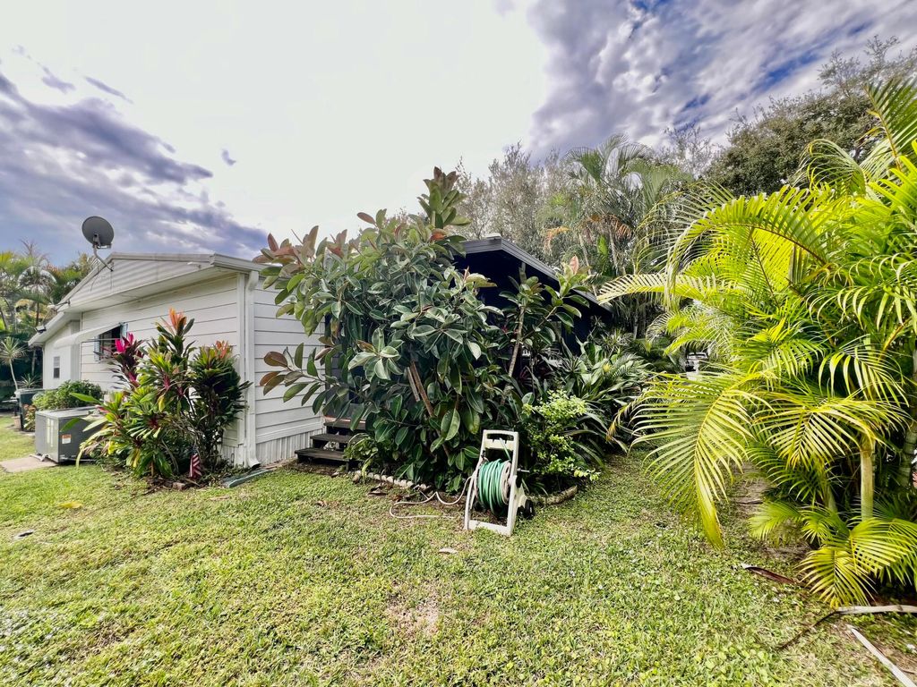 Photo of 6750 NW 44th Way, Coconut Creek, FL 33073 (MLS # R10966952)