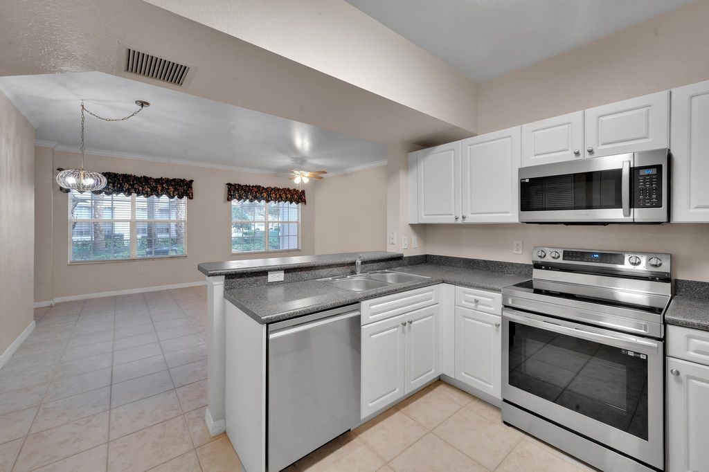 Photo of 577 SE Prescott Place, Stuart, FL 34994 (MLS # R10960015)