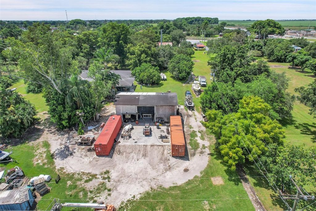 Photo of 1841 NW Avenue L, Belle Glade, FL 33430 (MLS # F10537137)