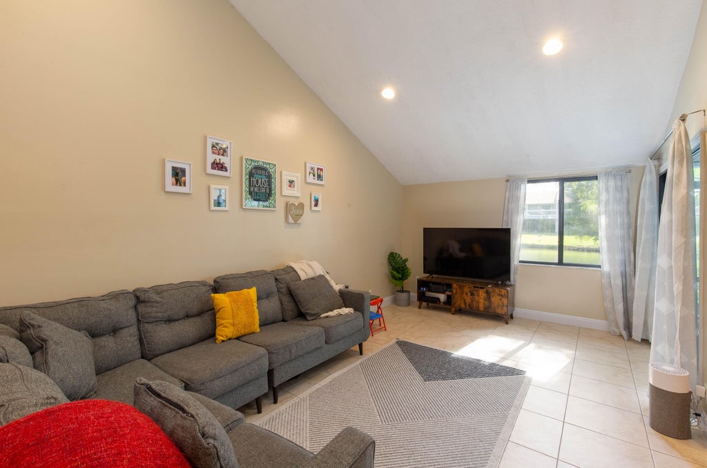 Photo of 1599 Woodbridge Lakes Circle, West Palm Beach, FL 33406 (MLS # B26041906)