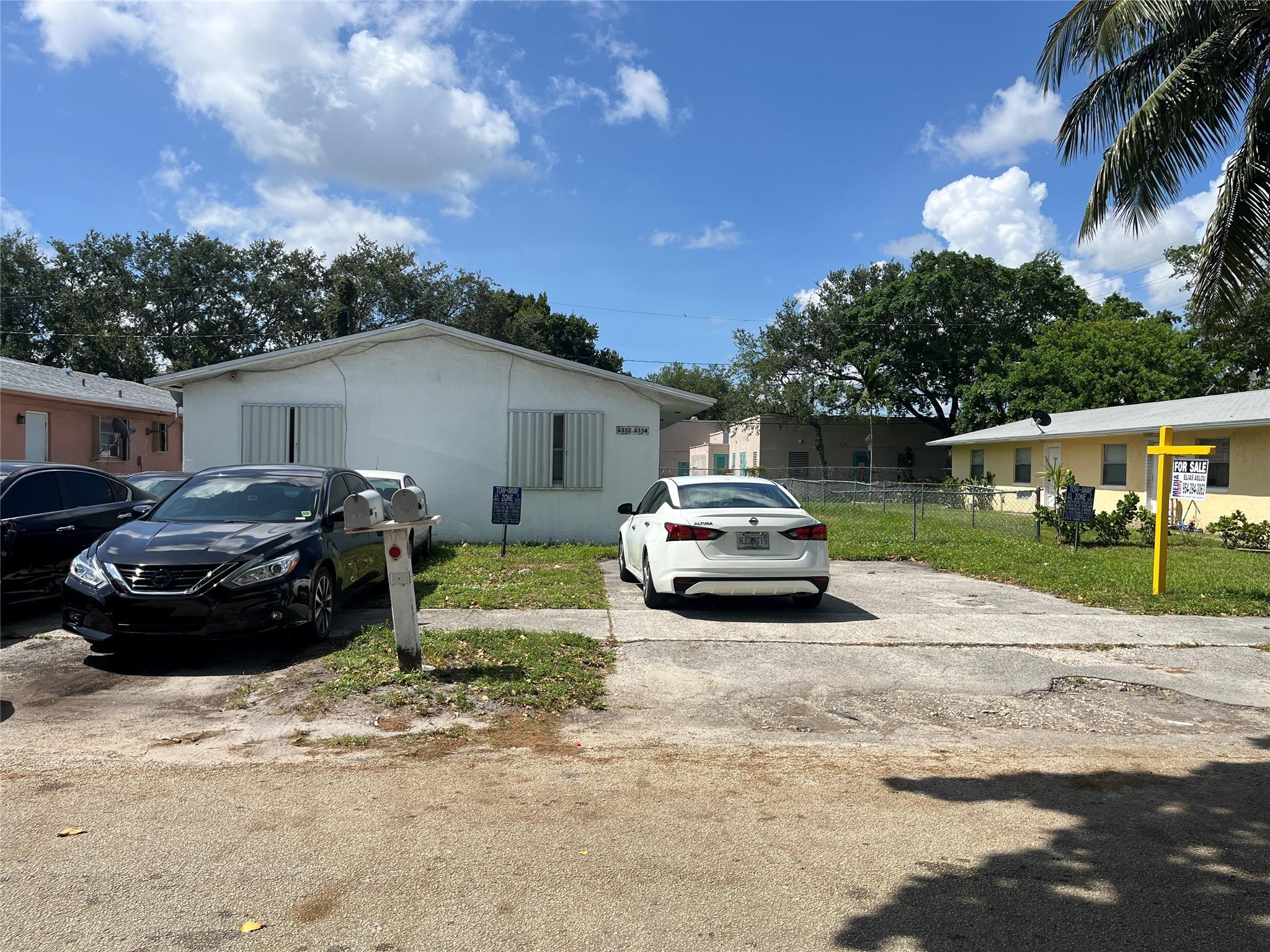 Large duplex. nice size bedrooms. rent on the 3/2 is very low. The owner is occupying the 2/1 for now . Water heater 5 yrs. For 2/1 the average market rent is $2300 a month. The average market rent for 3/2 is 3400 a month. Roll up shutters on all windows. Close to Nova university for higher learning, and other colleges. close to high schools and middle schools. Ideal for owner living in one side and let the other side pay the mortgage. Minutes to the turnpike, Hard Rock,I95, I75. Ideal Central location. Close to Hollywood beach. The rent is way below the market rent. Laundry room with W/D hookup in both units. Please drive by the property only. Do not talk to any of the tenants. For showing please call listing agent can show 2/1 by appt only.