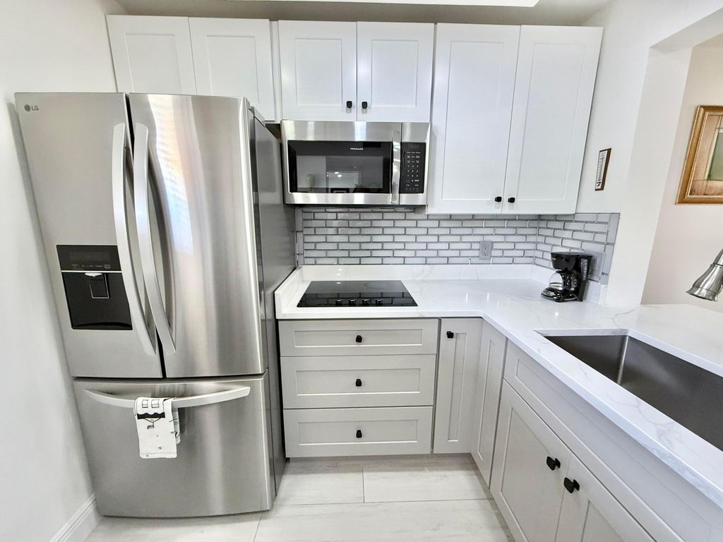 Photo of 2615 NE 3rd Court #1060, Boynton Beach, FL 33435 (MLS # R11159091)