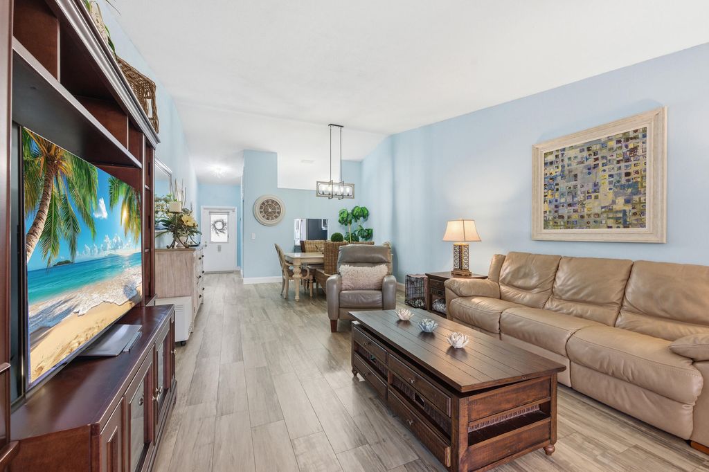 Photo of 705 Sunny Pine Way #H, Greenacres, FL 33415 (MLS # R11162688)