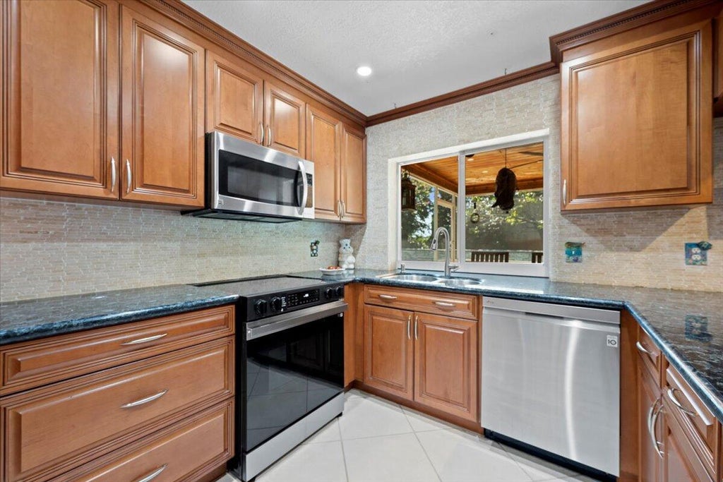 Photo of 9613 Begonia Street, Palm Beach Gardens, FL 33410 (MLS # R11061793)